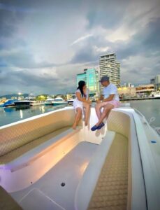 couple enjoying on a boat in santa marta